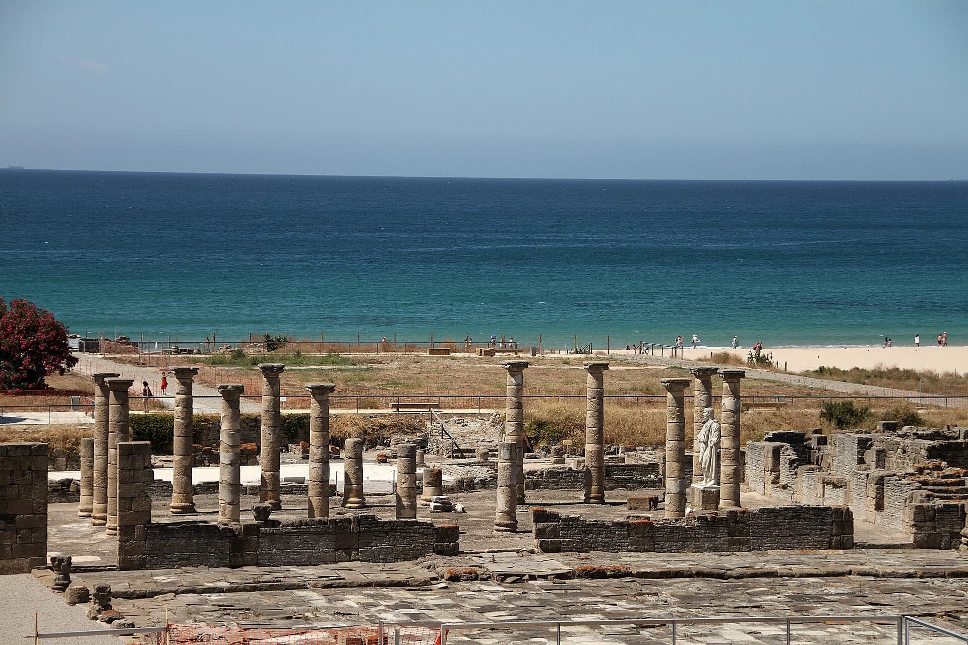 The Roman columns of Baelo Claudia standing above Bolonia beach
