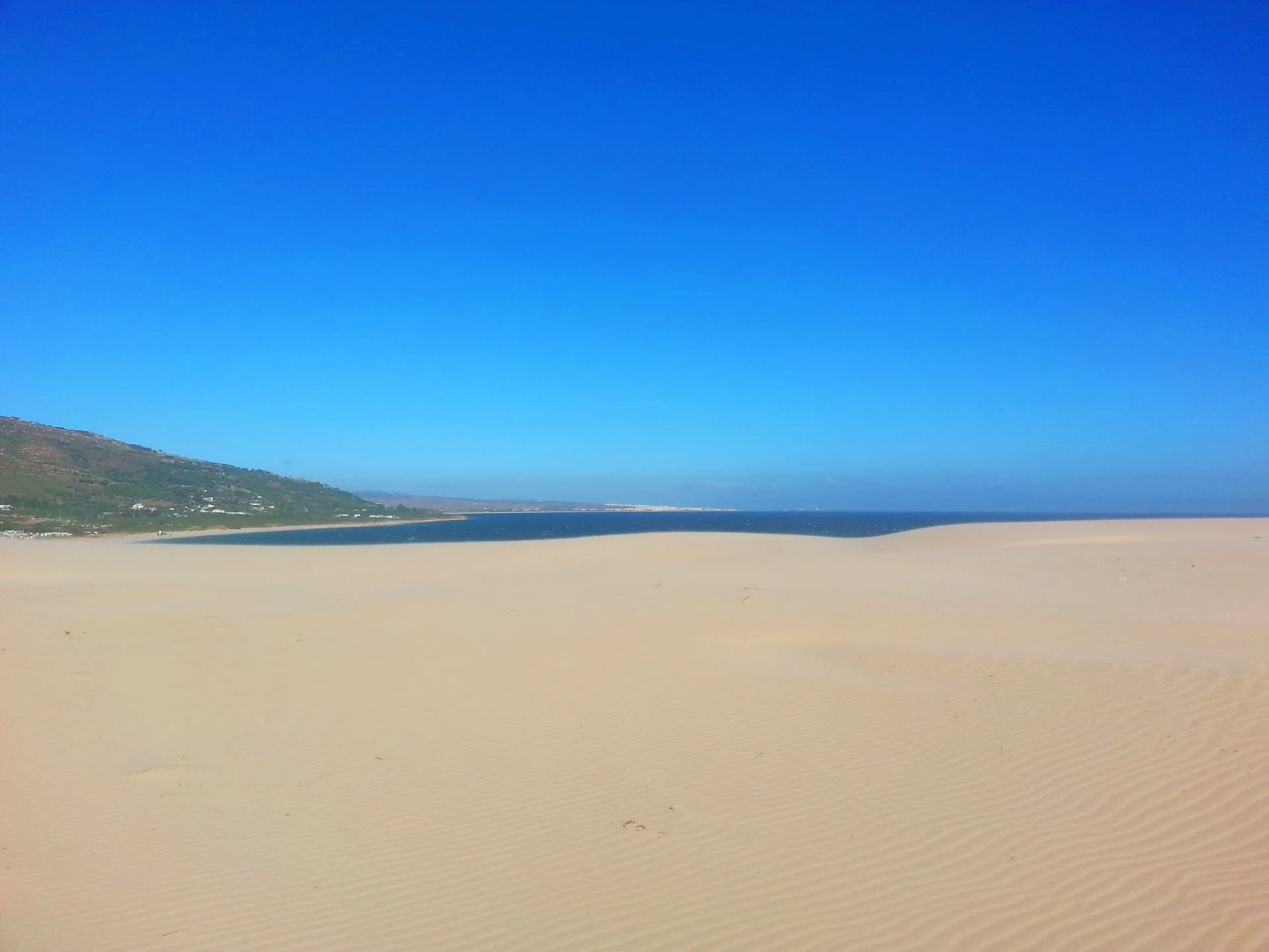 The big white dune above the bay at Punta Paloma