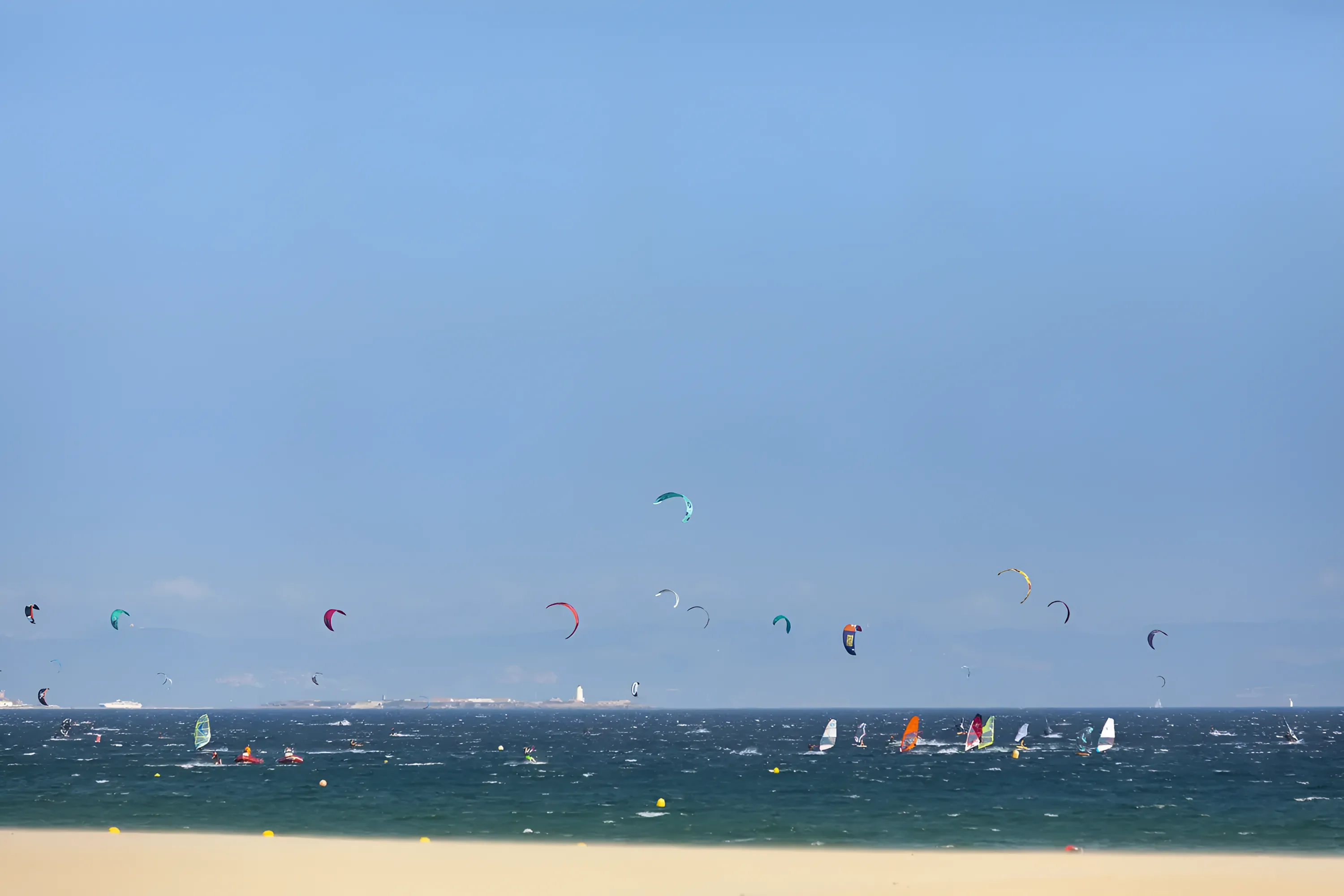 Kitesurfers on the water at Valdevaqueros beach
